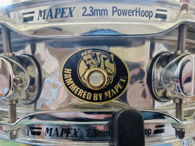 BPST435H 14"x3.5" Hammered Stainless Steel _Brazil badge). Photo - Justin