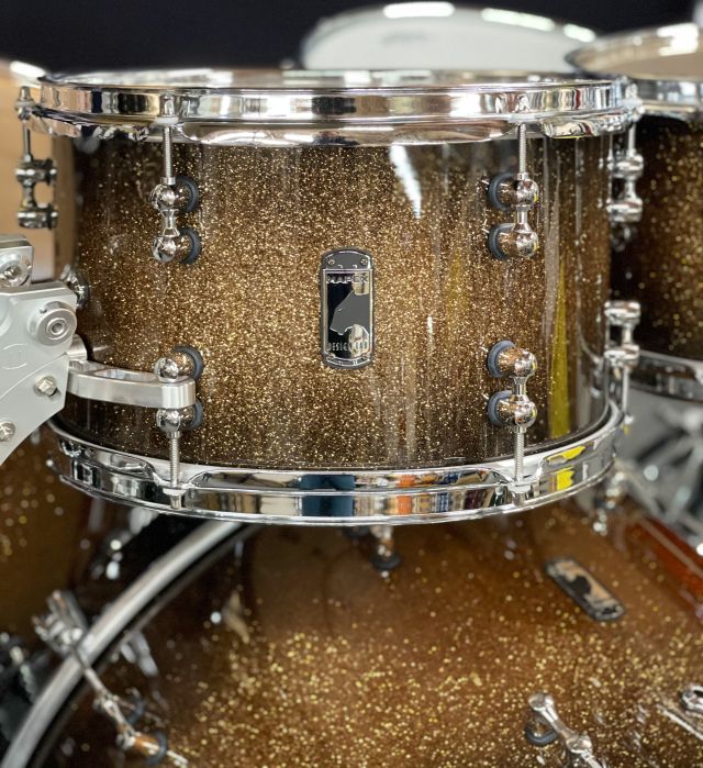 Versatus - Gold Sparkle Burst