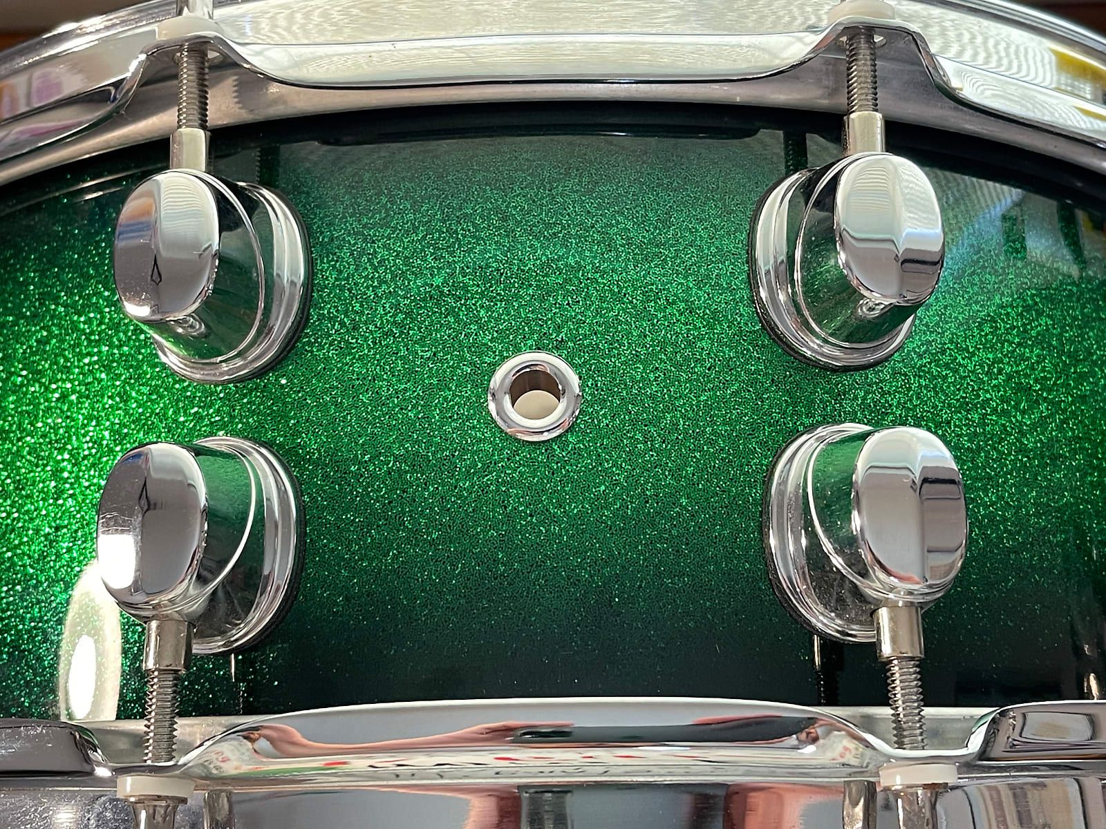 14"x5.5" Saturn Green Apple Burst. Photo - Zack Cruz