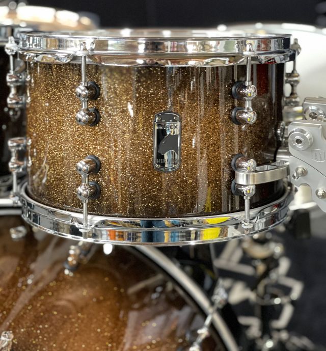 Versatus - Gold Sparkle Burst